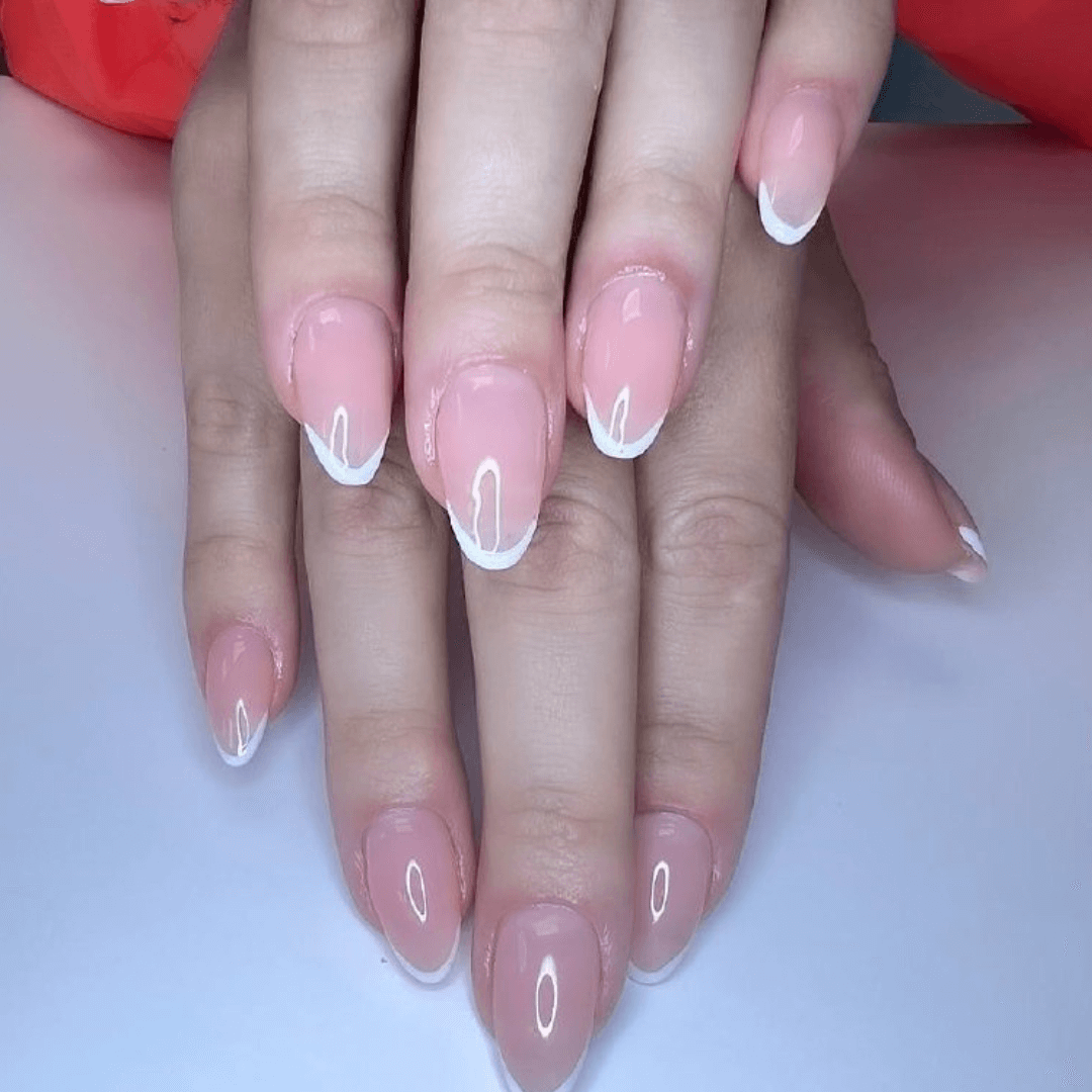 Nude Almond Nails with Subtle French Tips