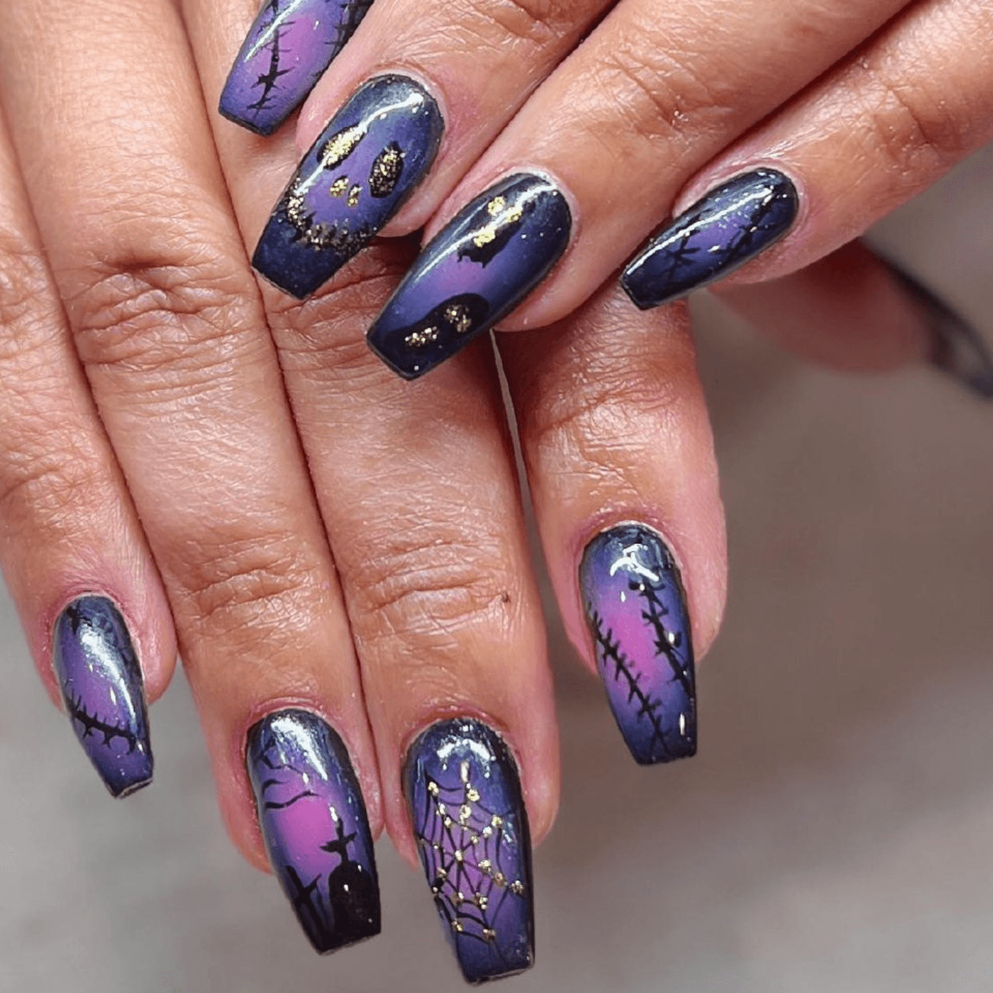 Dark Purple Nails with Gold Accents