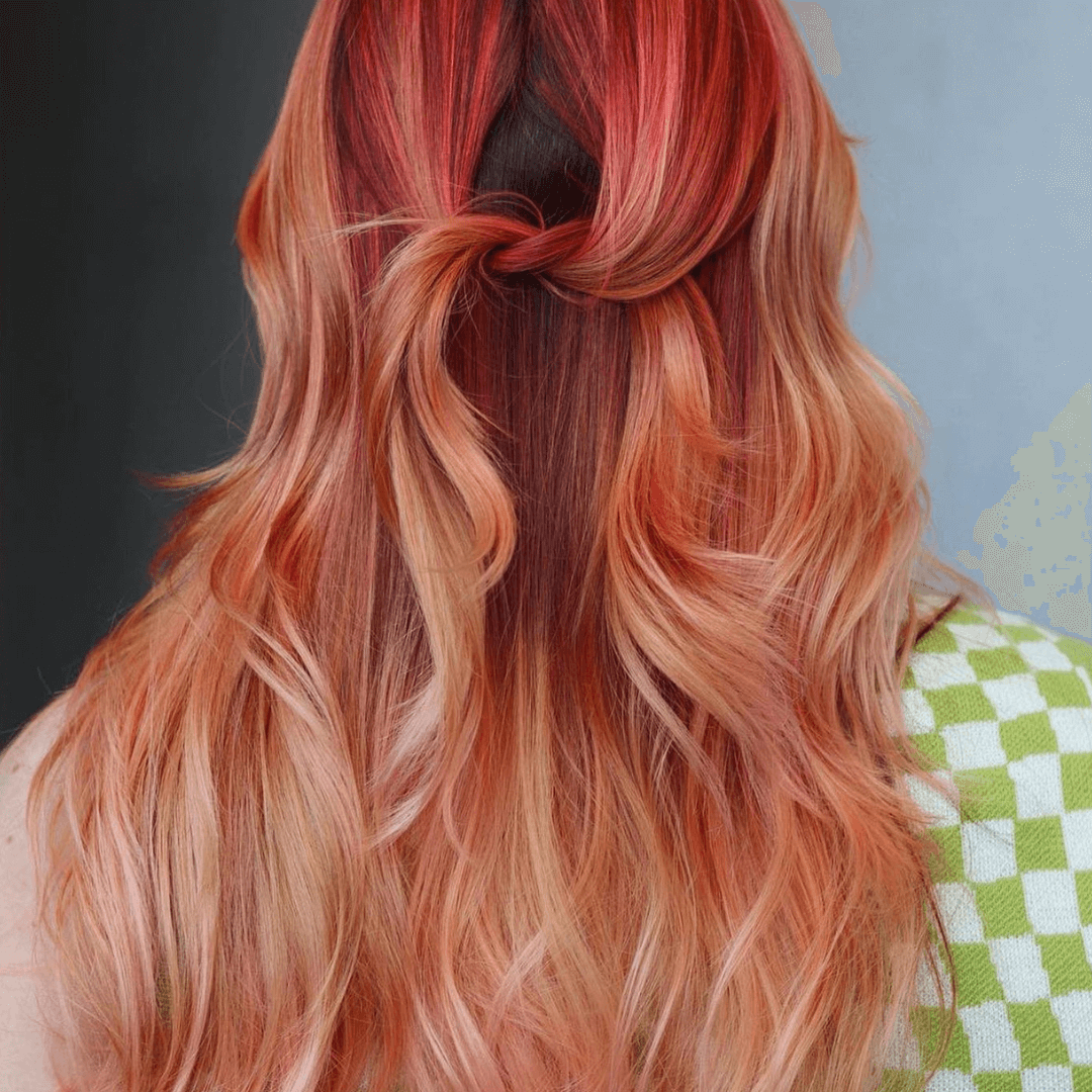 Ginger red hair color with blonde highlights