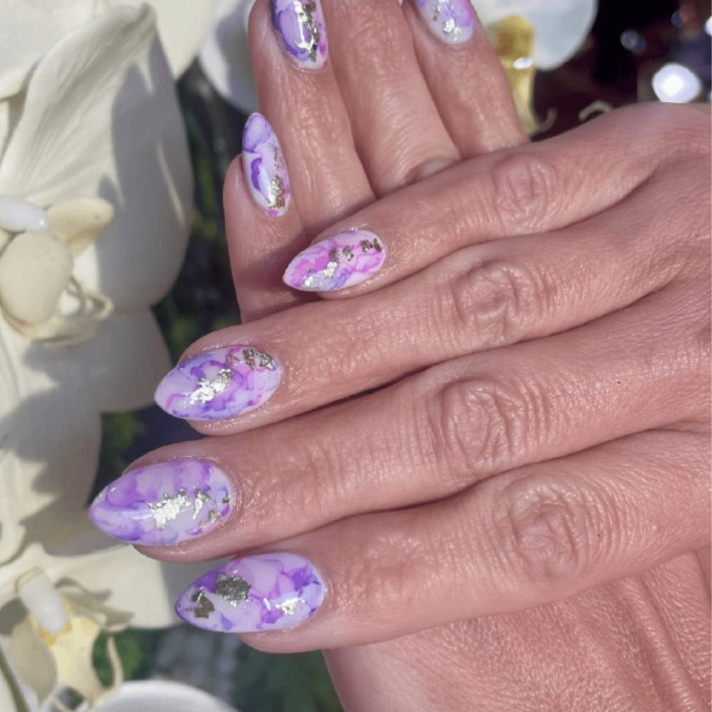 Short Almond Acrylic Nails with Marble Design