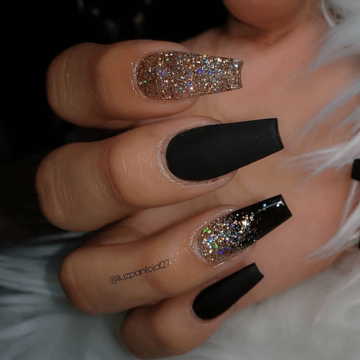 Black and gold ombre nails