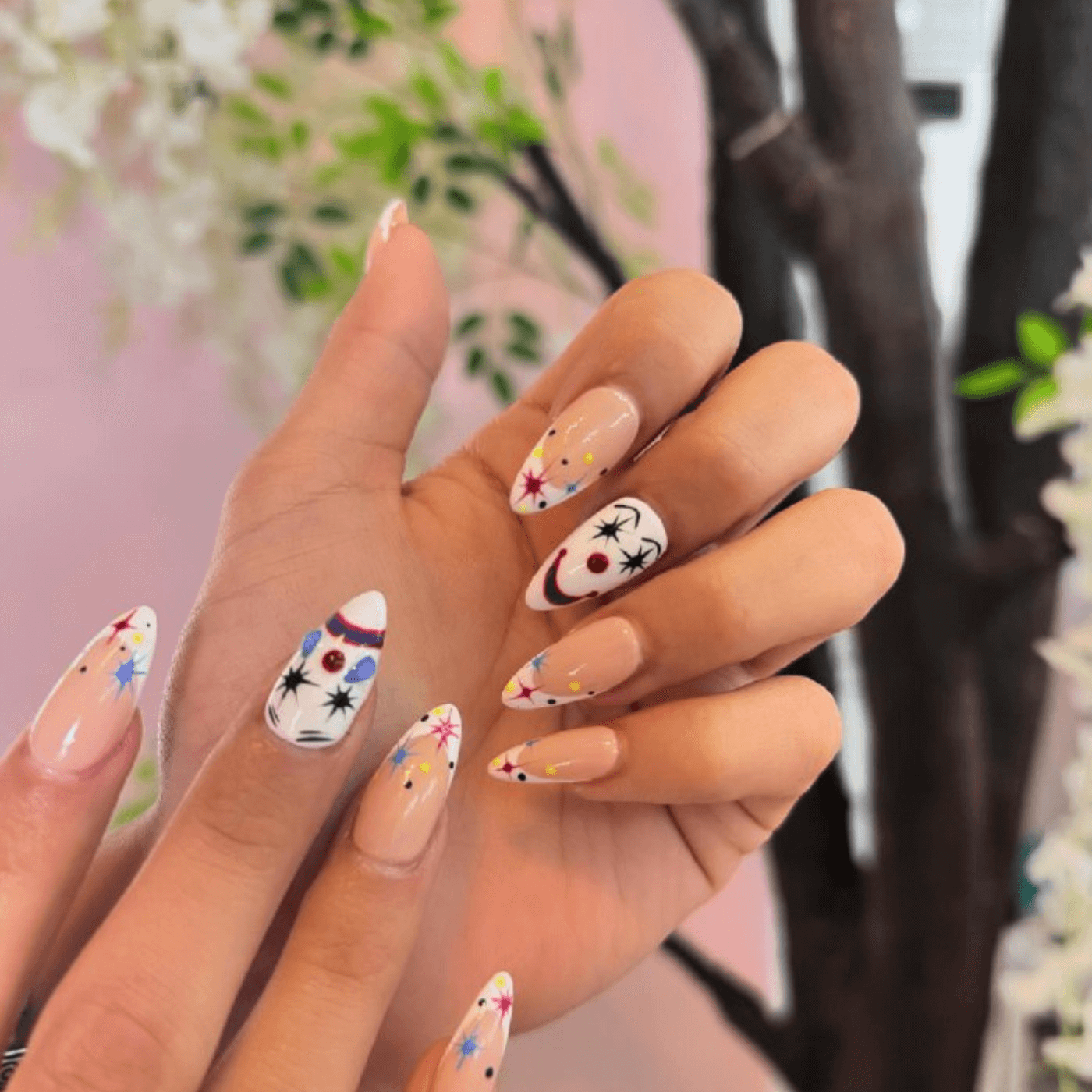 Halloween-Themed Nails with Stars and Moons