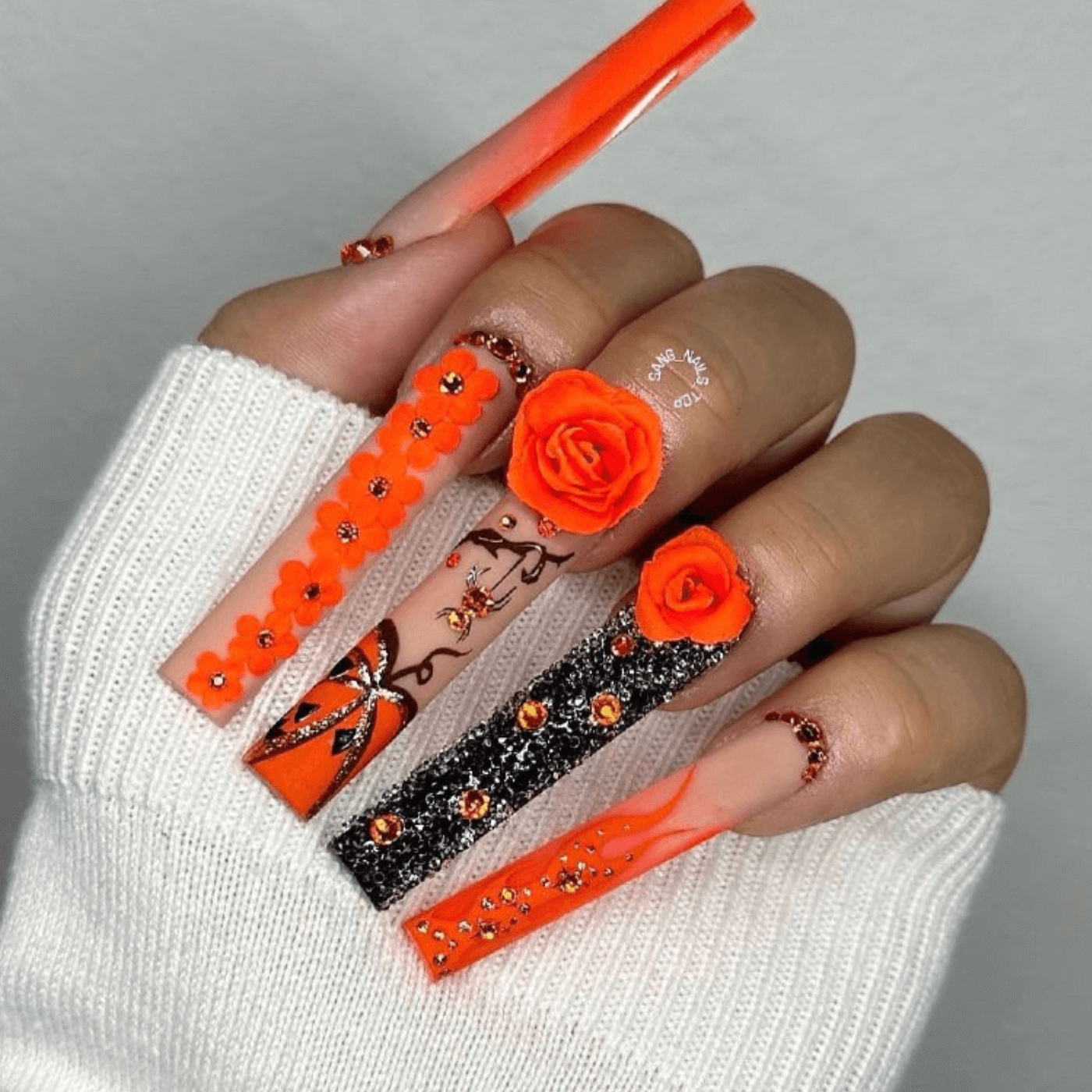 Orange Halloween Nails with Glitter