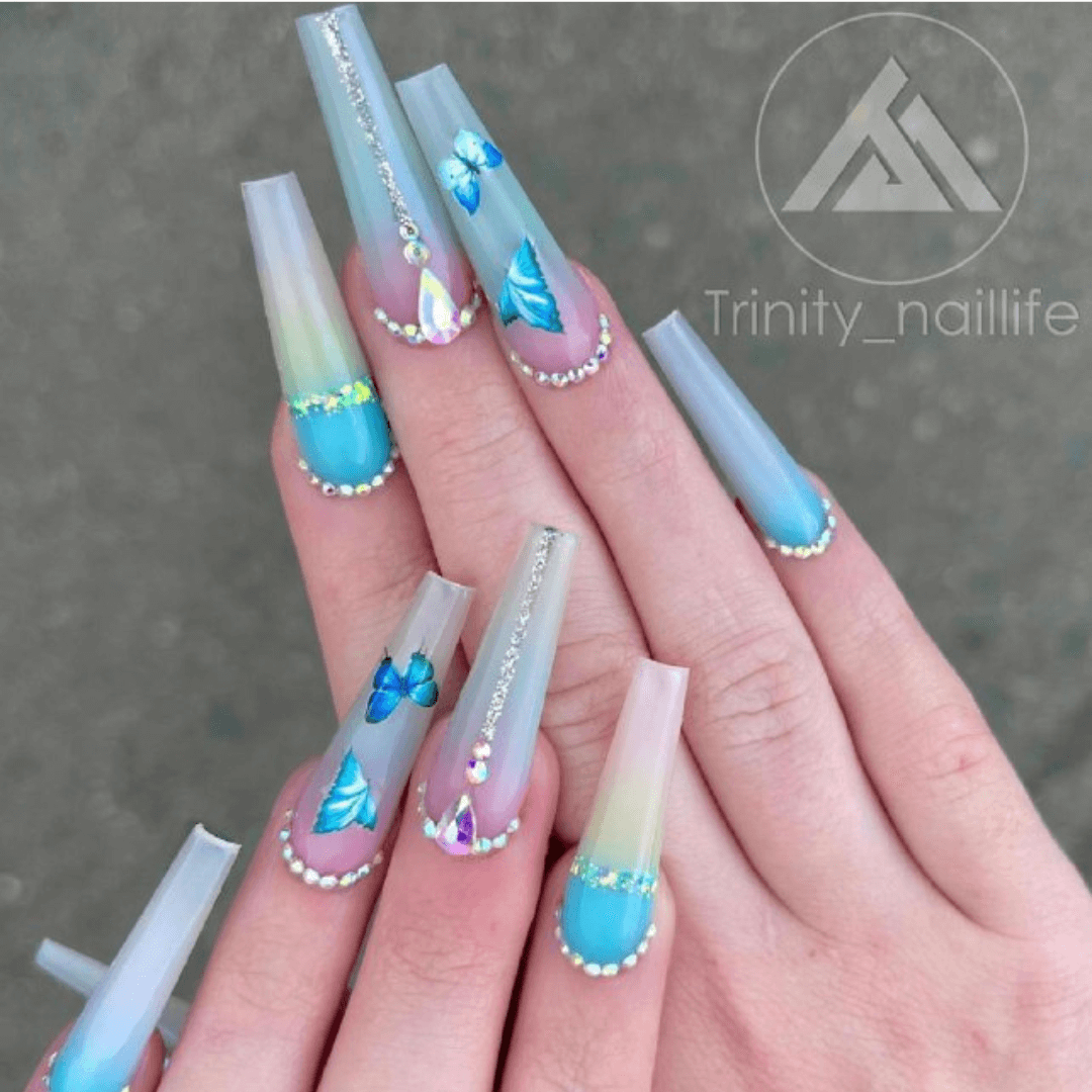 Butterfly Nail Art on Blue Nails