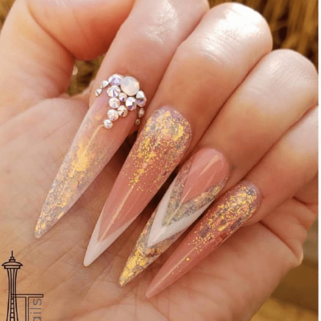 Nude Stiletto Nails with Gold Accents