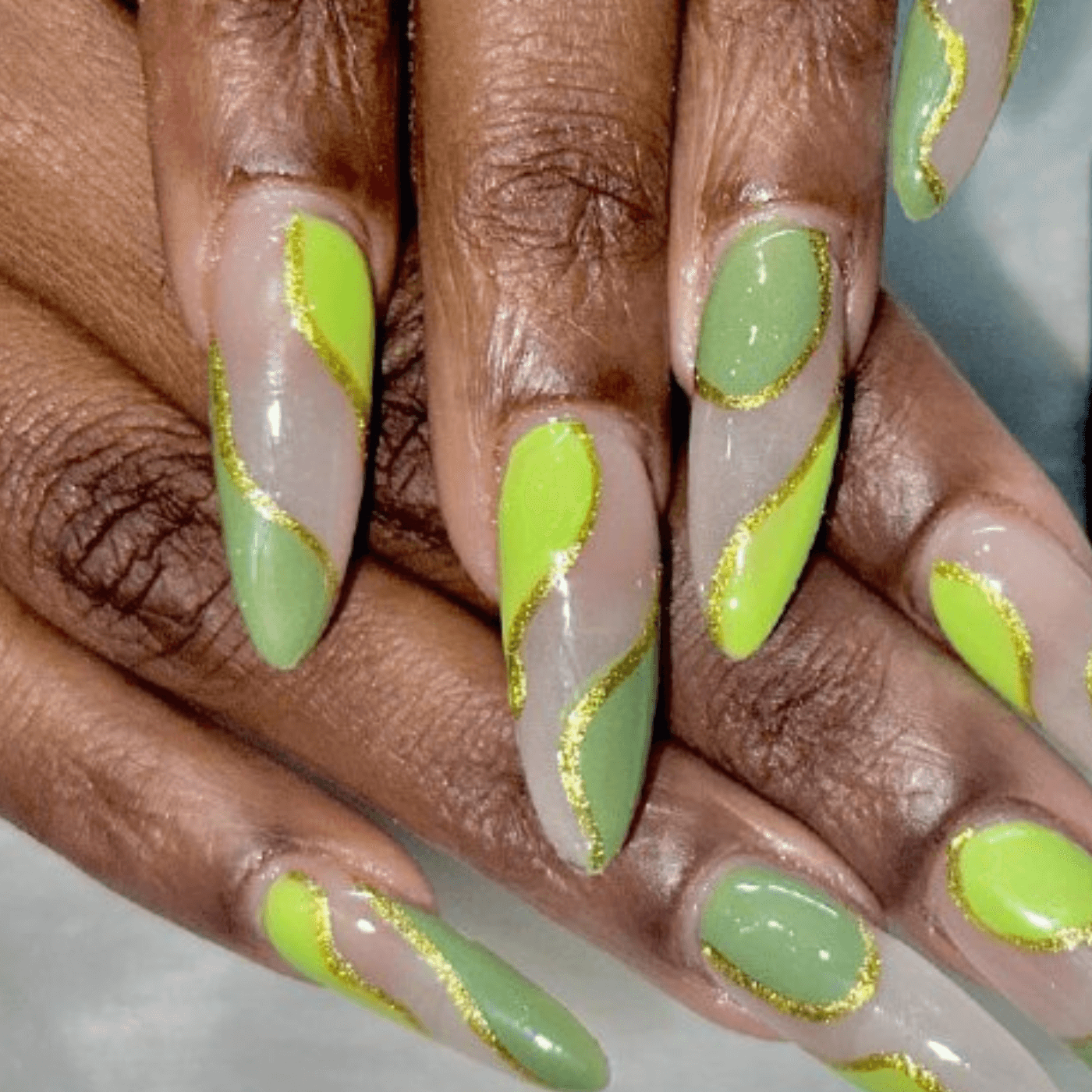 Green Nails with Gold Glitter