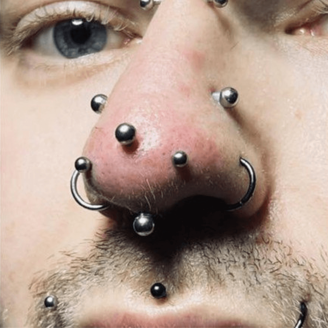 kolczyk-w-nosie-vertical-tip-piercing