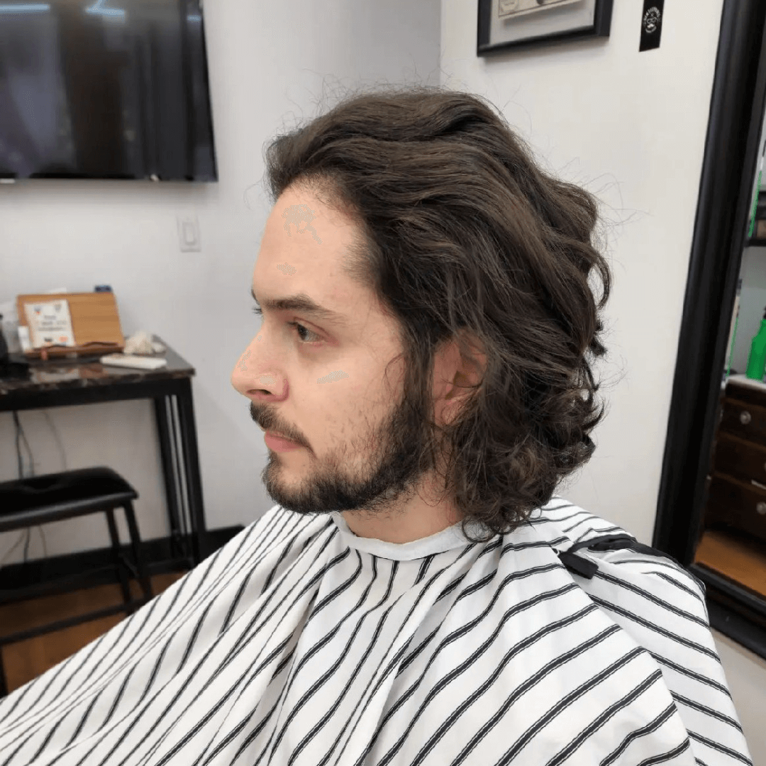 Hairstyle for men thin hair shaggy, swept-back haircut