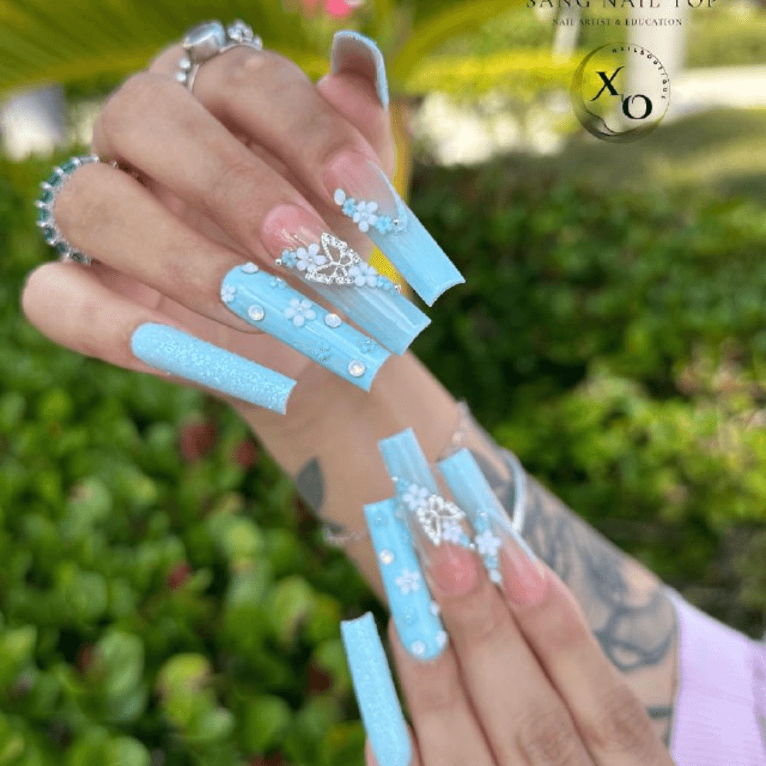 Blue Nail Art with Diamonds