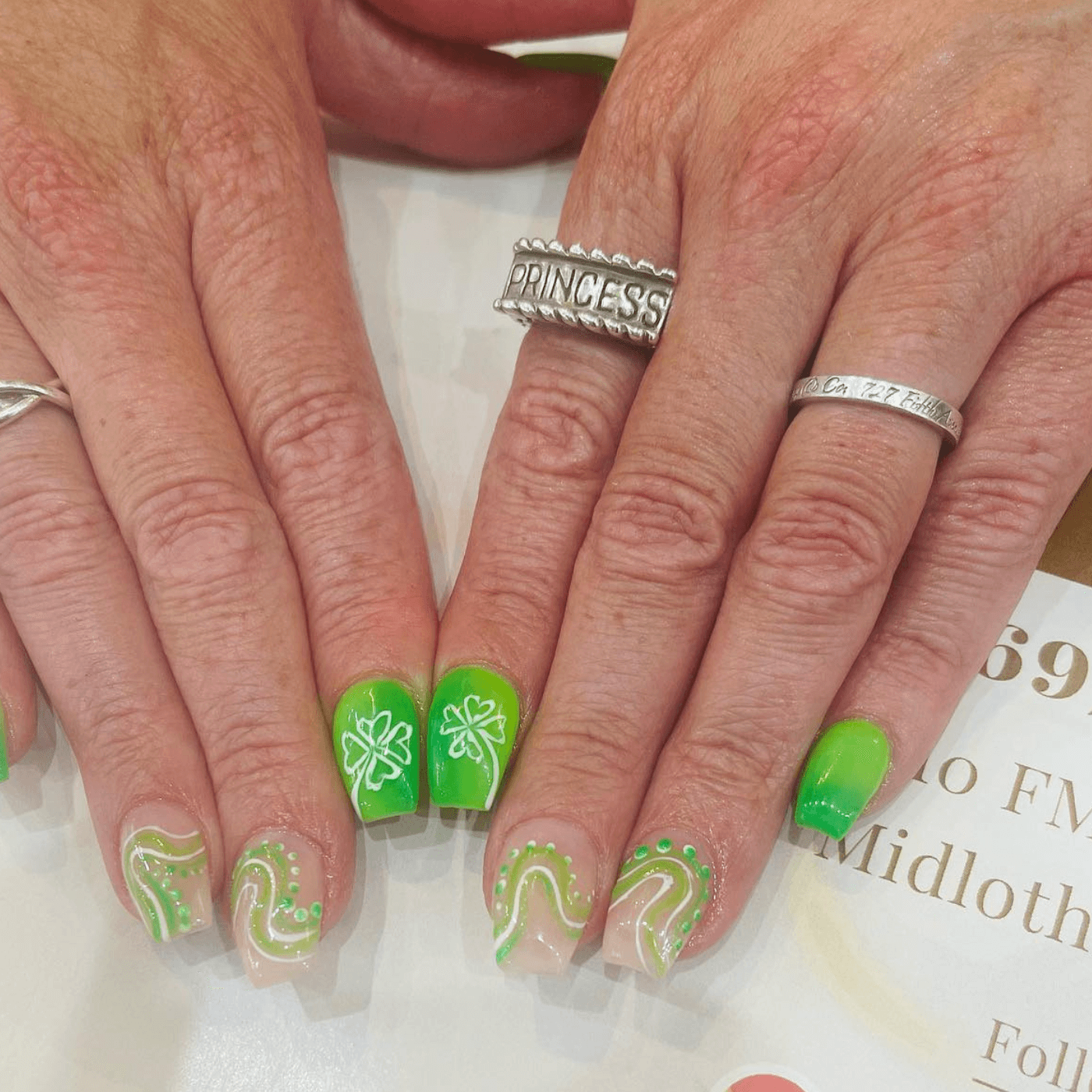 Green Nail Art with Swirls