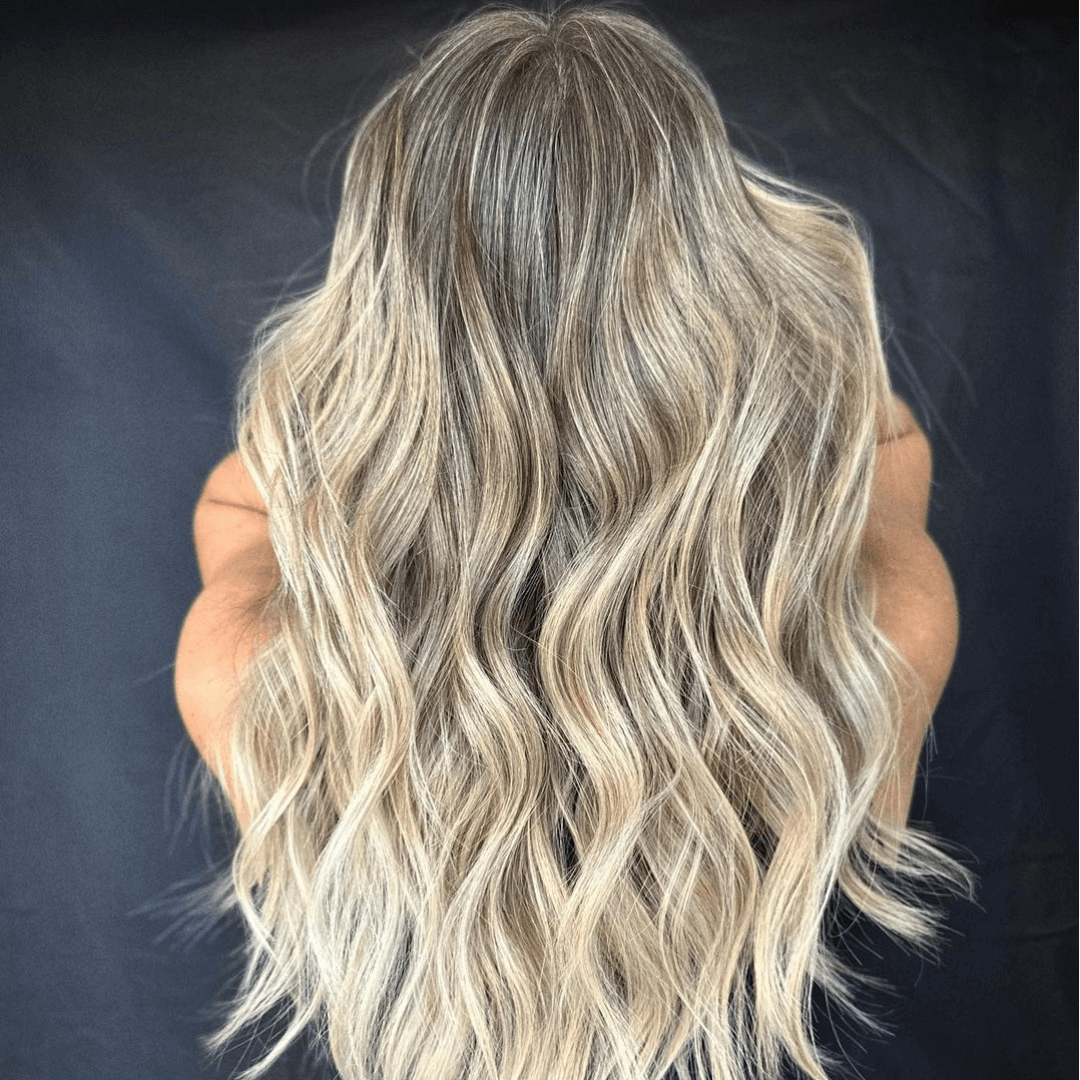 Long curls with balayage and shadow roots 