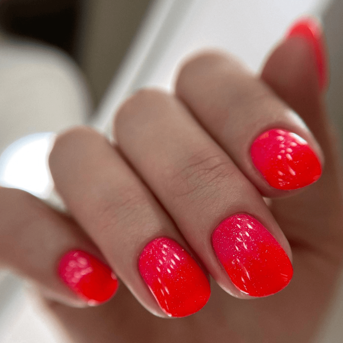 Pink ombre nails with glitter