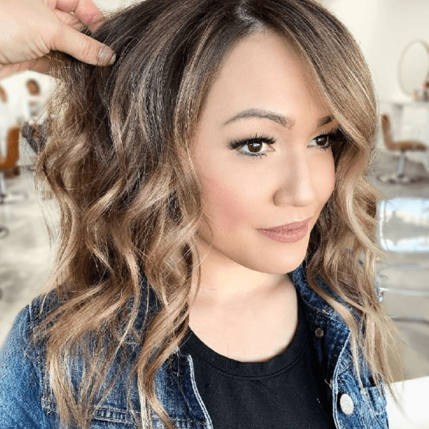 Medium Layered Hair With An Off-Center Part