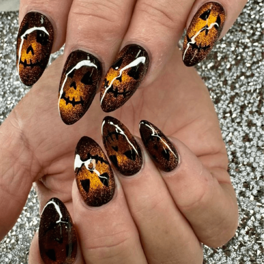 Black Almond Nails with Gold Accents